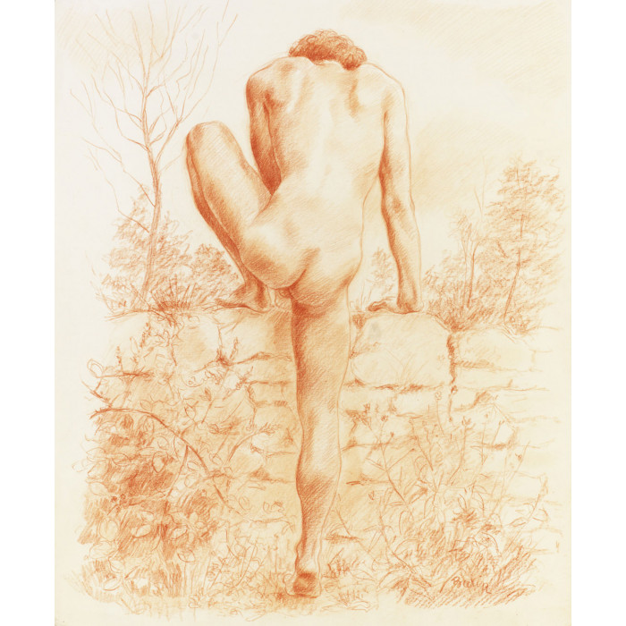 Garçon grimpant sur un muret