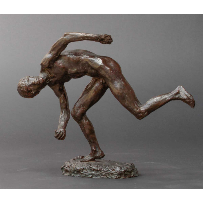 Angelo jeune garçon ramassant une balle