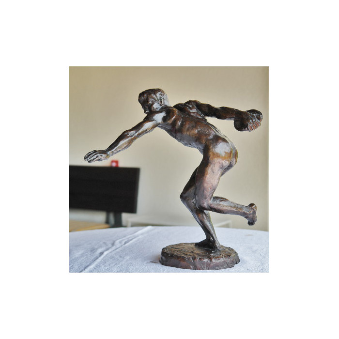 Etienne lançant le disque