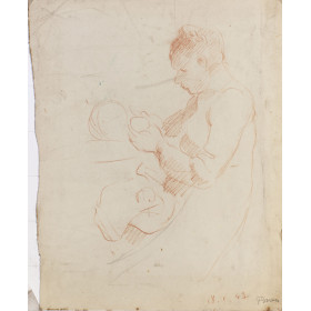 Femme assise donnant le biberon à un bébé