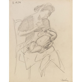 Femme assise donnant le biberon à un bébé