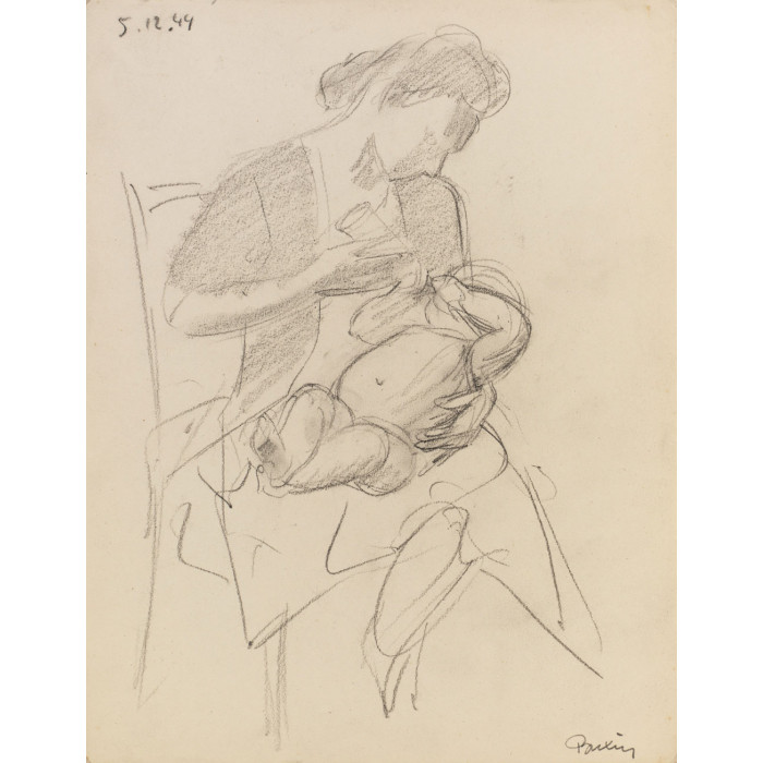 Femme assise donnant le biberon à un bébé