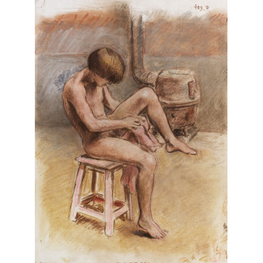 Adolescent garçon s'essuyant, assis sur un tabouret, dans l'atelier