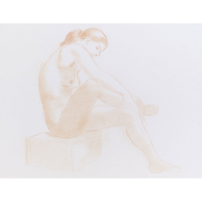 Femme assise s'essuyant le pied