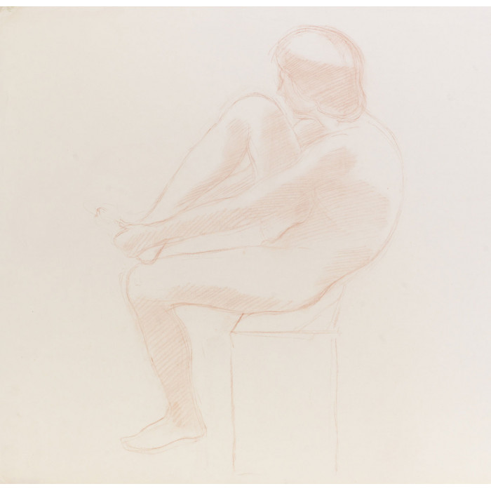 Adolescent assis le pied dans la main