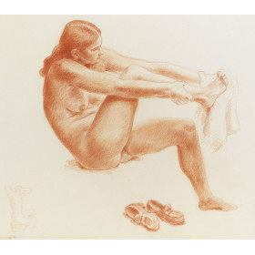 Femme nue assis de face s'essuyant le pied